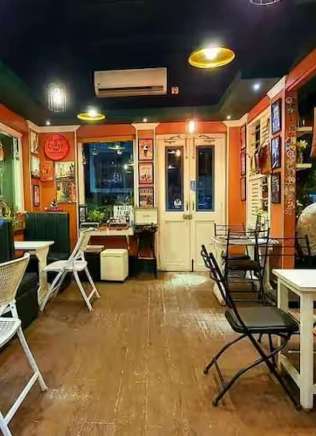 This image is of a coffee shop named 'Cafe by the Lane'. It is in Kolkata